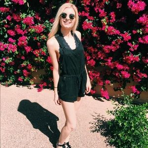 Aritzia Black utility romper. Worn 3X. Like new.